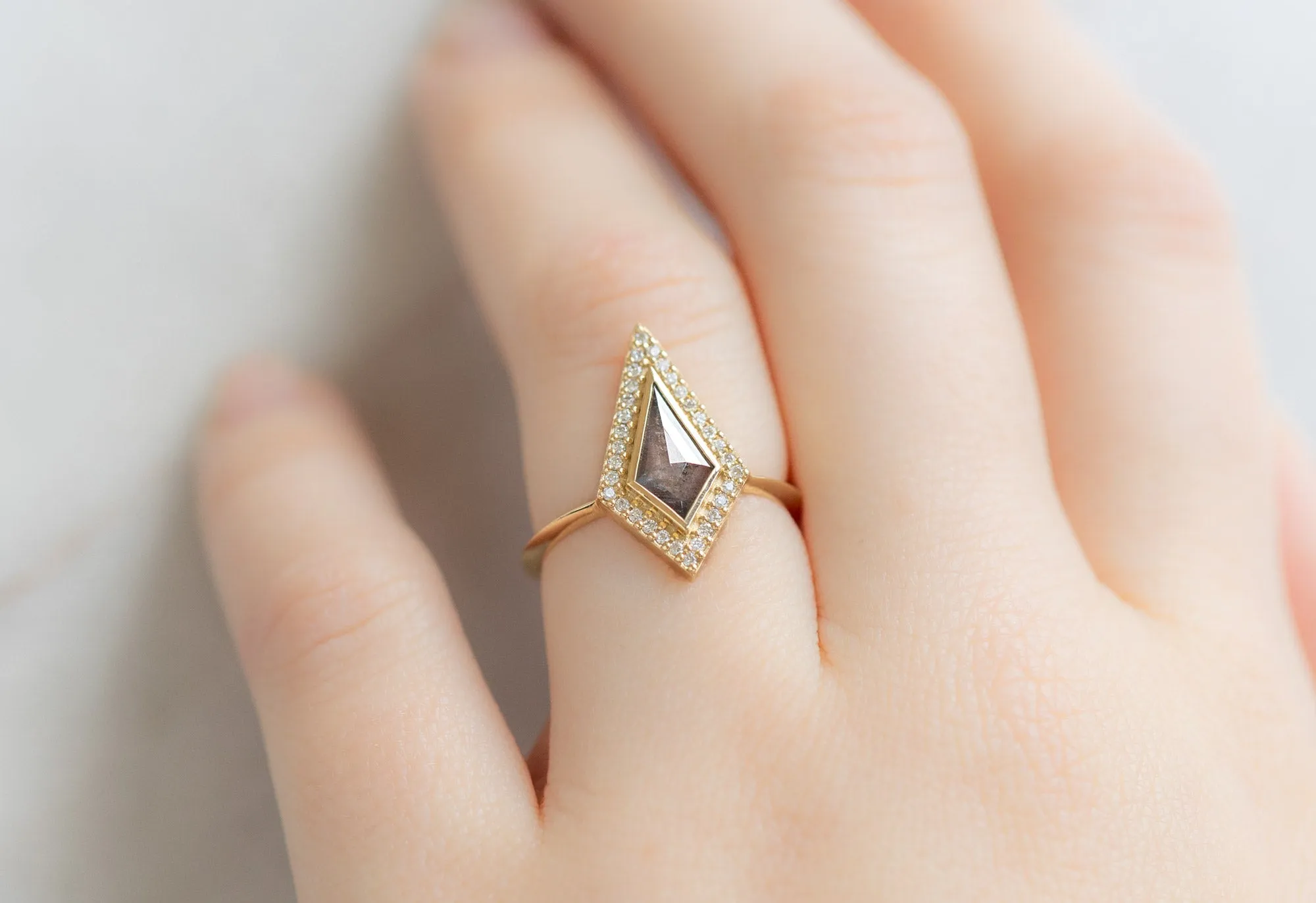 The Dahlia Ring with a Kite-Shaped Salt and Pepper Diamond